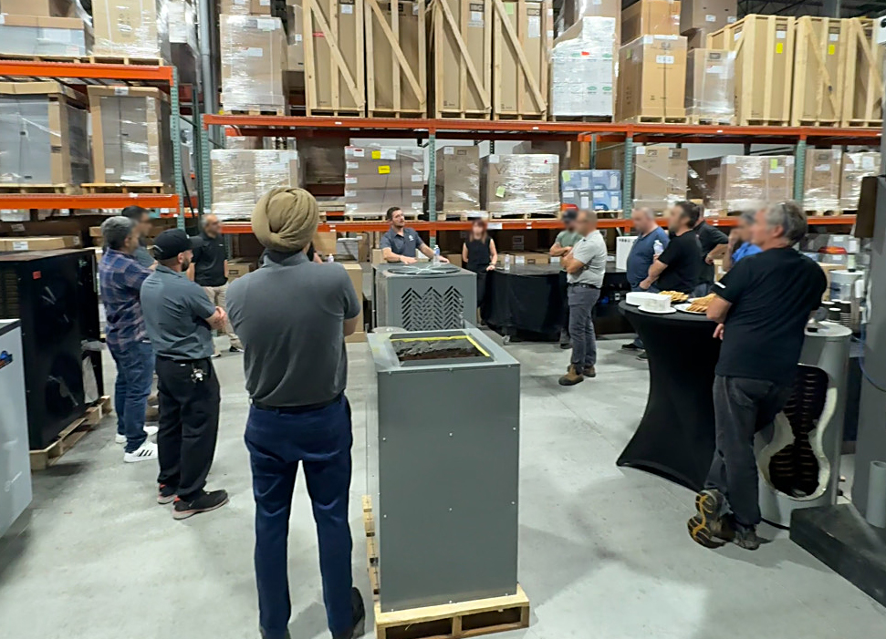 Bo DeAngelo of ANESI during a training session in Canada on the features of the Anes Gas Heat Pump
